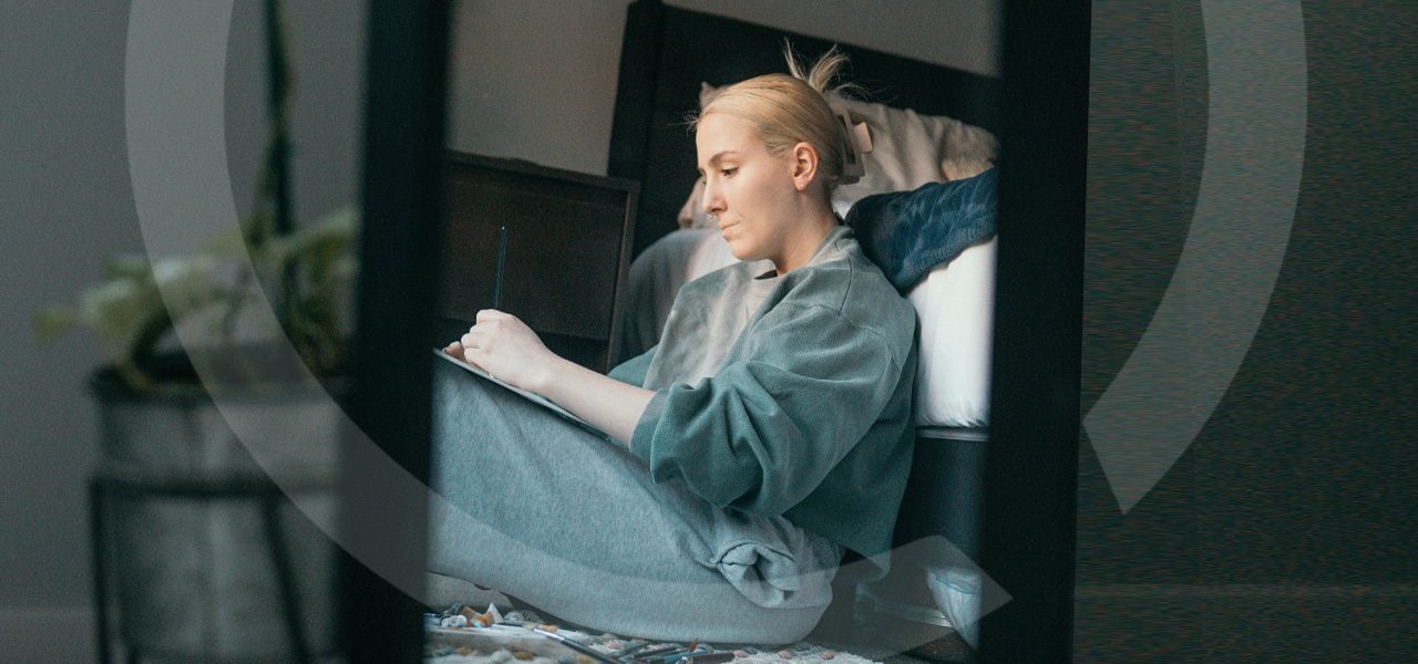 Woman writing in her journal